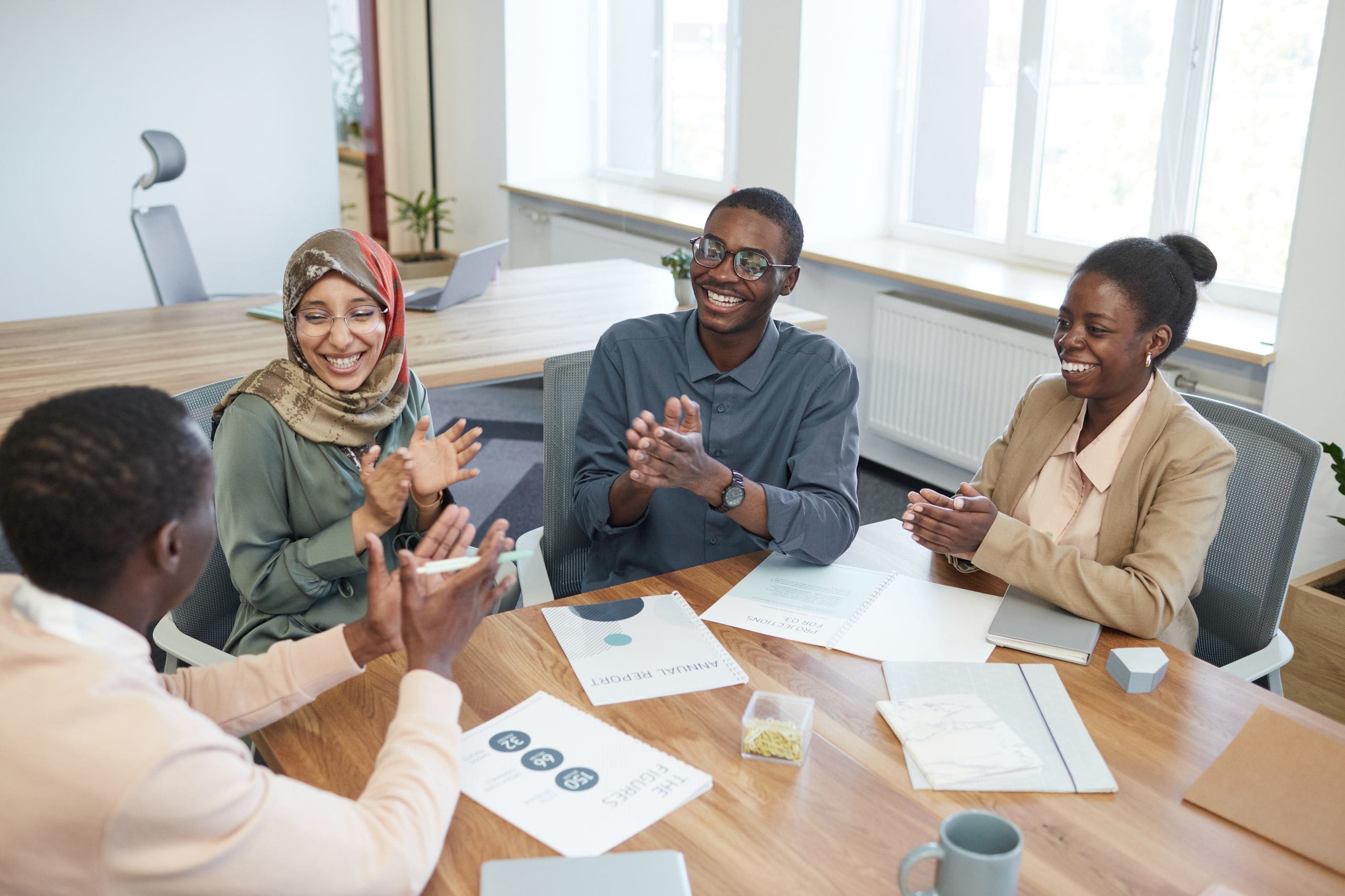 A diverse team of Foundation staff and community partners in genuine conversation